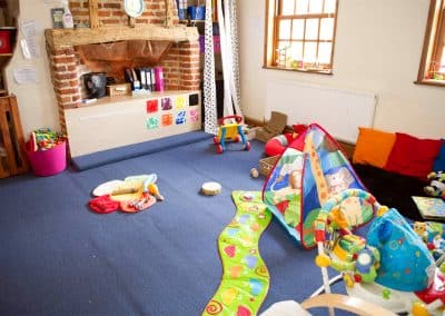 Clarence House Godmanchester Nursery baby room with toys