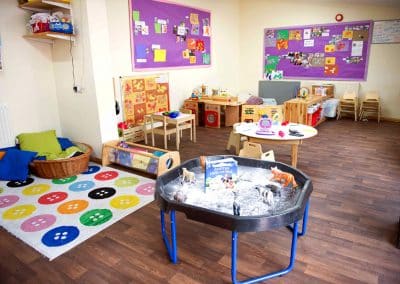 Clarence House Godmanchester Nursery toddler room with variety of toys and activities