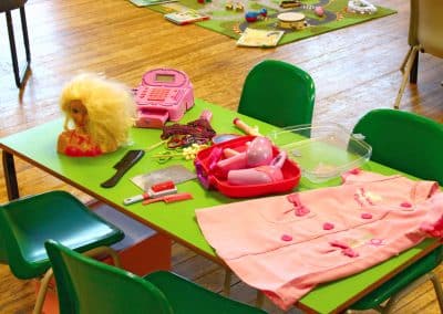 Table display with hairdresser toys at Godmanchester preschool