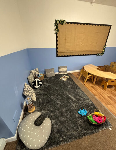 Reading and relaxing corner in the toddler room at Clarence House Boston